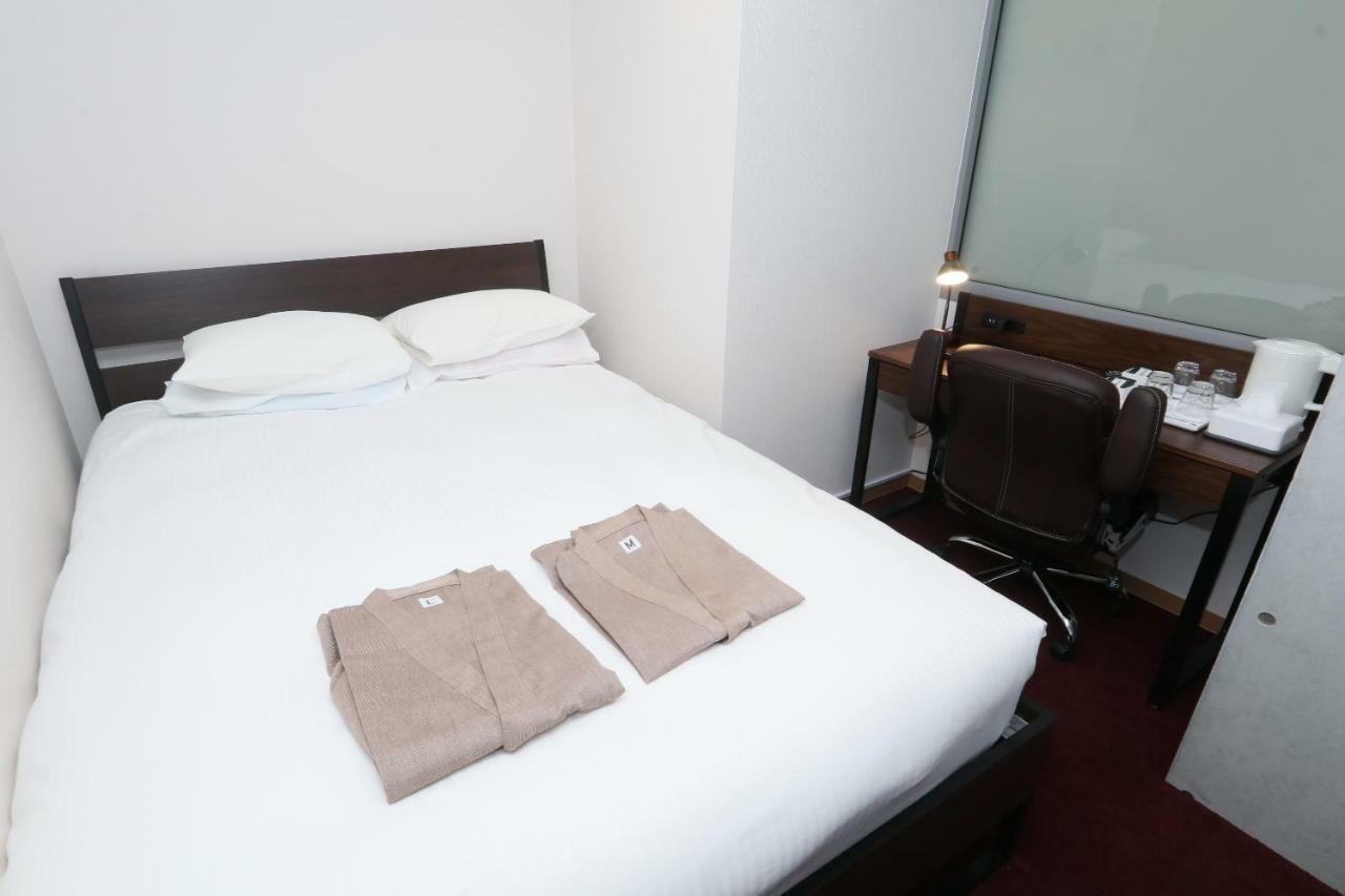 Business Capsule Lightning Asakusa Hôtel capsule